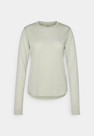 Long-sleeve light green shirt made from textured fabric, featuring a round neckline and a small logo on the left chest area.