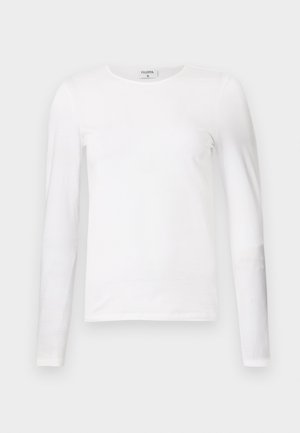 T-shirt bianca a maniche lunghe realizzata in cotone morbido, con scollatura rotonda e design slim fit con cuciture pulite e senza pattern visibili.