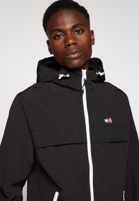 Tommy Jeans CHICAGO  - Vindjacka - black