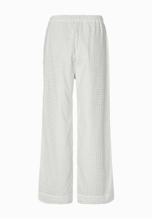 Bredde bukser i hvid, med et struktureret vaffelmønster, elastisk talje og rå kanter. Stoffet virker let og åndbart.