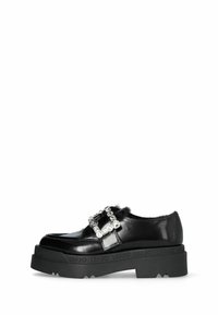 Black patent leather shoe with thick black sole, featuring a decorative buckle with gemstones and subtle fur accents on the upper.
