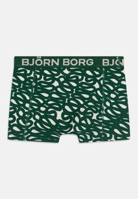 Zelene i krem bokserice s uvijenim uzorkom, sa čvrstim zelenim pojasom na kojem je u bijelom ispisano "BJÖRN BORG".