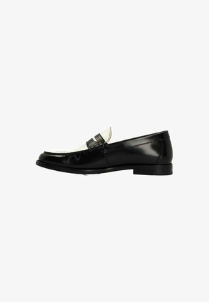 Black leather loafer with a textured upper, white accent, and a low heel. Features a decorative strap and stitching detail along the edge.