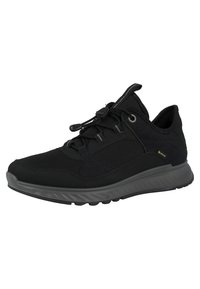 Scarpa sportiva nera con tomaia in rete e materiale sintetico, design senza lacci, colletto imbottito e suola in gomma testurizzata per una buona aderenza.