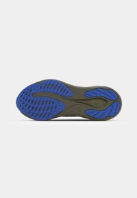 Shoe sole with a predominantly gray base, accented with blue rubber treads. Features grooves for traction and flexibility.