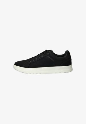 Black sneakers with a textured upper, white rubber sole, and round toe. Features perforated accents and classic lace-up design.
