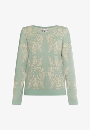 Svetlozelený pletený sveter s výstrihom do V a dlhými rukávmi, s krémovým kvetinovým a vtáčím vzorom po celom povrchu. Rybárske manžety a spodný okraj.