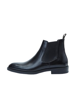 Botas Chelsea de cuero negro con paneles laterales elásticos y una lengüeta, con un acabado suave y un tacón bajo apilado.