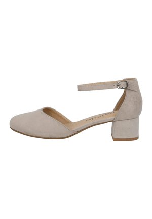 Scarpa beige in suede con tacco a blocco e cinturino alla caviglia, apertura sulla punta e design semplice. Presenta una superficie testurizzata e un tacco stabile.