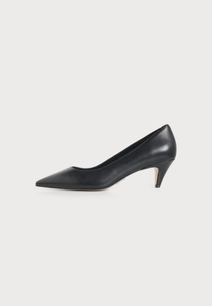 Black leather women's pump with pointed toe and mid-height slim heel on a white background.