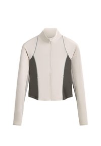 Bunda na zip s dlouhým rukávem, světle béžovým tělem a tmavě šedými bočními panely, s vysokým límcem a předním zipem.