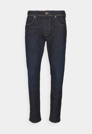 Temno modri denim kavbojki slim fit kroja, ki imajo pet žepov in gumbasto zapiranje. Kontrastni šivi ob šivih in robu.