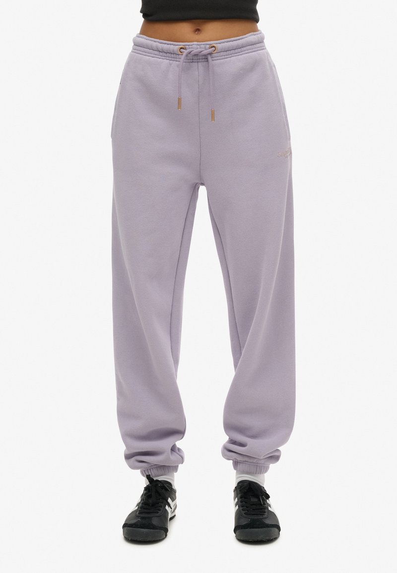 Lilac sweatpants met een relaxed fit, voorzien van een elastische tailleband met trekkoorden, geribbelde manchetten en zijzakken.
