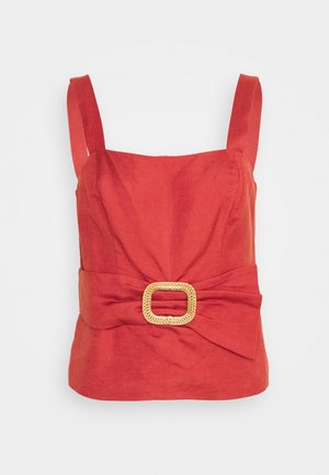 Sleeveless red top with square neckline and wide straps, featuring a wide belt with a large rectangular woven buckle at the waist.