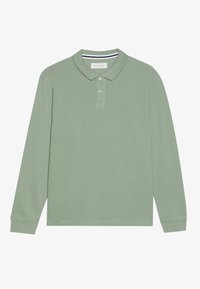 Lange mouwen polo in lichtgroene katoen. Voorzien van een klassieke kraag, een knoopsluiting met drie knopen en gestikte accenten op de mouwen.
