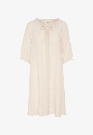 Vestido beige claro, de corte holgado, con escote redondo y detalle de lazo. Presenta mangas cortas abullonadas y un detalle de encaje vertical en la parte delantera.