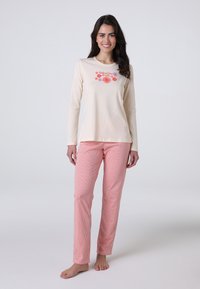 Maglietta leggera a maniche lunghe con ricamo floreale; abbinata a pantaloni da pigiama a righe rosa. Tessuto in cotone morbido con vestibilità rilassata.