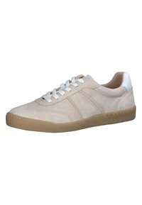 Beige nahkkingad valgete detailide ja kummitaldiga. Omab peeni tikandeid ja sileda tekstuuri.