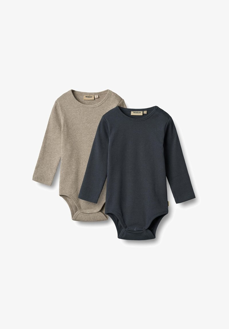 Deux bodysuits à manches longues en beige clair et en bleu marine foncé. Fabriqués en tissu doux avec des fermetures à pressions en bas et des encolures rondes.