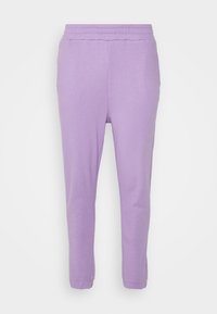 Lila sweatpants med en mjuk textur, elastisk midja och fållade anklar. Rakt skuren design utan ytterligare mönster eller detaljer.