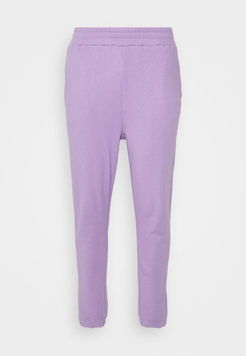 Lila sweatpants med en mjuk textur, elastisk midja och fållade anklar. Rakt skuren design utan ytterligare mönster eller detaljer.