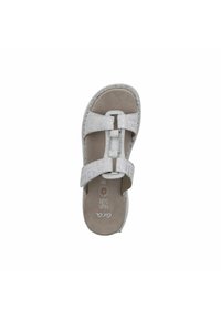Light gray sandal with dual adjustable straps, soft textured footbed, and printed accents. Designed for comfort with a sturdy sole.