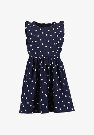Marineblauwe jurk met witte stippen, met een geribbelde textuur, gerimpelde schouderbanden en een aangesloten lijfje met een uitlopende rok.