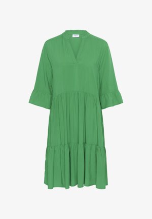 Grøn, kortærmet kjole med V-hals, flæse detaljer og en lagdelt skørt. Fremstillet af et letvægtsstof med en afslappet pasform.