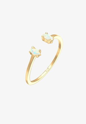 Zarter, offene Goldring mit zwei kleinen, birnenförmigen Opalsteinen, die einander gegenüber auf einem dünnen Band gesetzt sind.