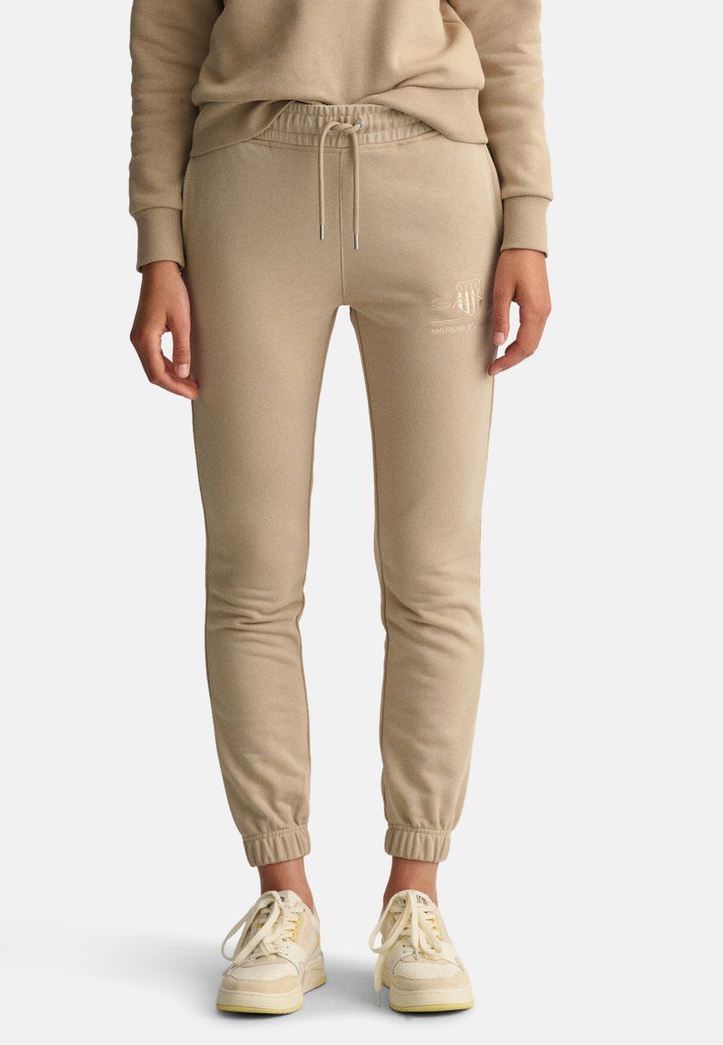 GANT TONAL ARCHIVE SHIELD Tracksuit bottoms concrete beige/beige Zalando.de