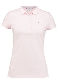 Jasnoróżowa koszulka polo z bawełny, z krótkimi rękawami, trzema guzikami oraz małym logo na piersi.