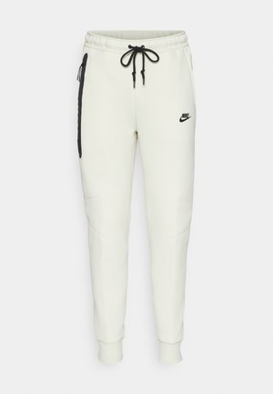 Nike Sportswear Pantalon de survêtement - sea glass/black