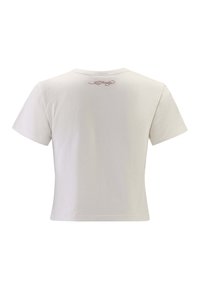 Kortebanden, crèmekleurig T-shirt met een ronde hals en geborduurde details op de bovenrug. Gemaakt van zachte, lichte stof.