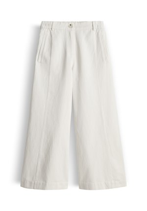 Pantalon blanc à jambes larges et taille haute, avec poches latérales, bouton à l'avant et ceinture élastique au dos.