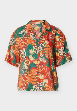 Lühikeste varrukatega nööpidega särk erksates troopiliste lille- ja lehemustrites, mis on oranži, rohelise, kollase ja sinisega punasel taustal.