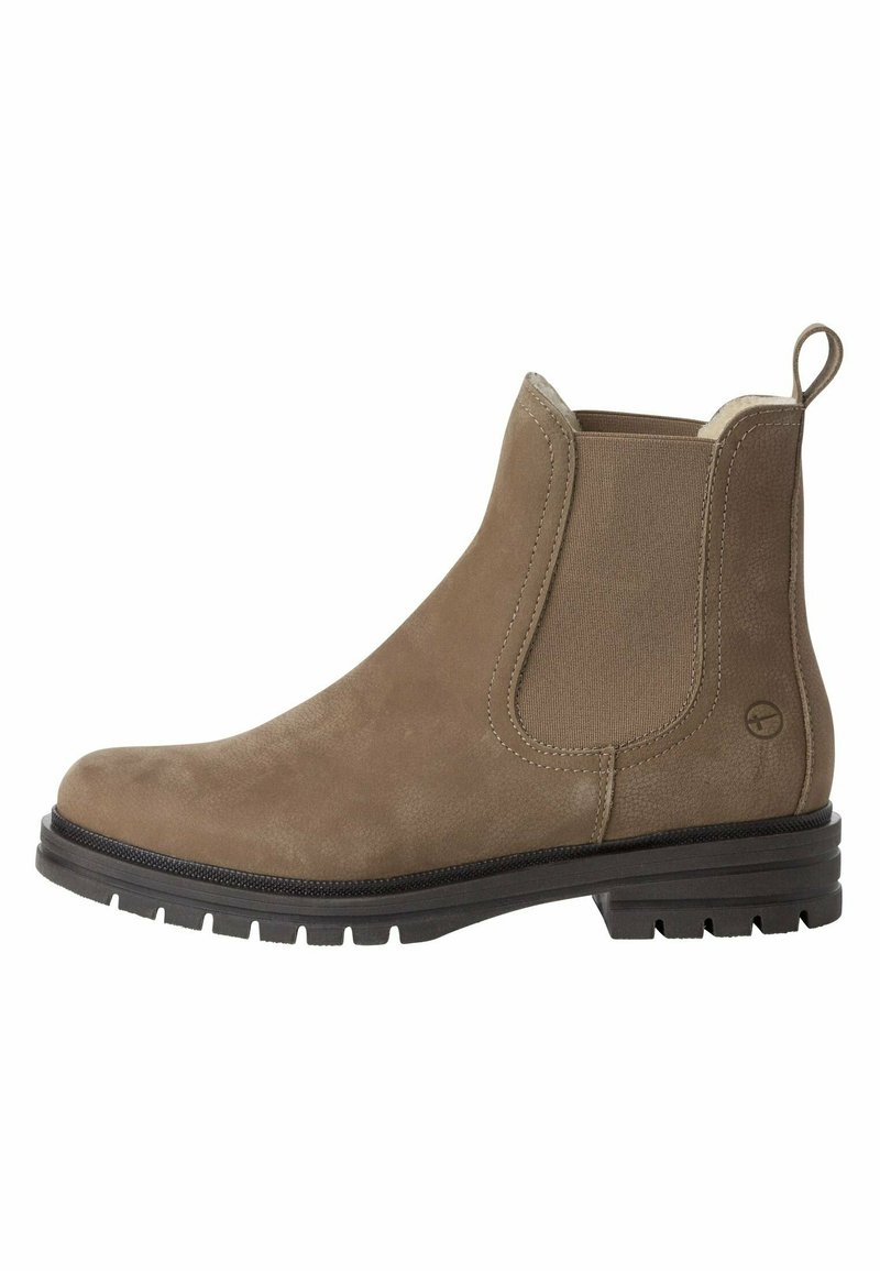 Botte Chelsea en daim marron avec panneaux latéraux élastiques, languette à l'arrière et semelle à crampons en caoutchouc noir.