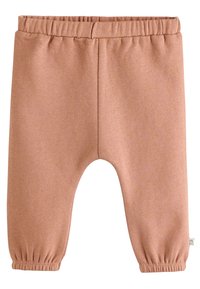 Heledad roosa, elastse vöökohaga püksid, mille sääred on pahkluude ümber kogutud, valmistatud pehmest, tekstureeritud kangast, lihtsa kujundusega, ilma kaunistusteta.