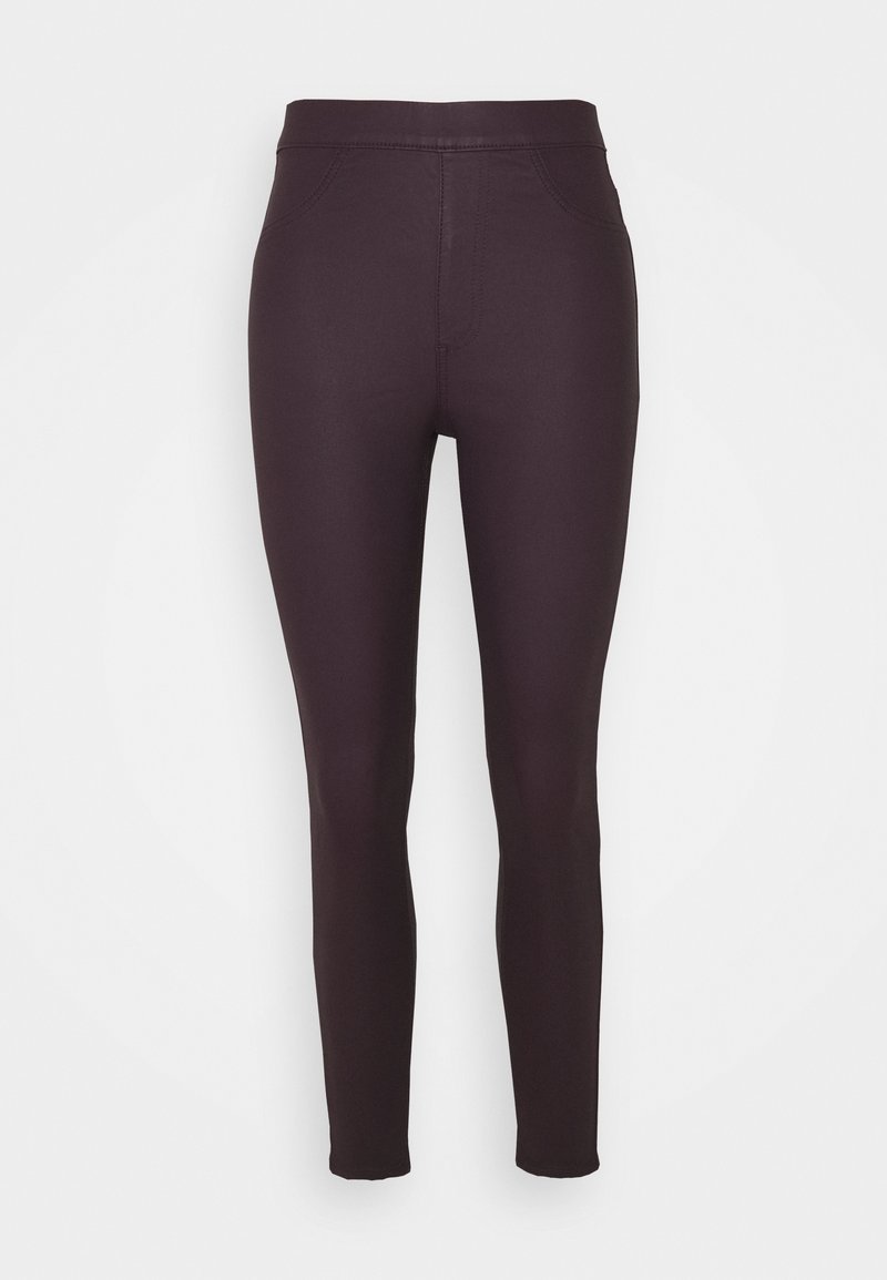Leggings de color púrpura oscuro, fabricados con un material elástico, que presentan una textura suave, una cinturilla alta y sin cierres ni bolsillos visibles.