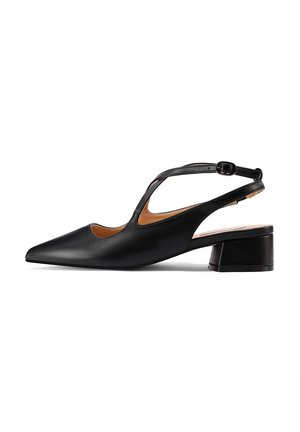 Le décolleté in pelle nera con cinturino presenta una punta affusolata, un design con tagli e un tacco basso a blocco. La cinghia è regolabile con una fibbia.