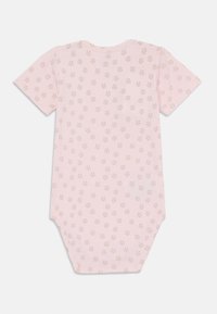Kortærmet rosa bodystocking med et blomstermønster i hvidt og orange. Lavet af blød bomuld, med rund halsudskæring og benåbninger.