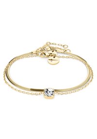 Bracciale in tonalità oro con una pietra in zirconia cubica trasparente, design a catena stratificata e catena a serpente, dotato di chiusura sicura e lunghezza regolabile.