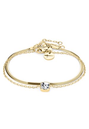 Goudkleurige armband met een heldere cubic zirconia steen, voorzien van een gelaagde ketting, slangkettingontwerp en een veilige sluiting met verstelbare lengte.