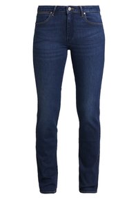 Jeans de mezclilla azul oscuro con un ajuste slim, diseño clásico de cinco bolsillos, costuras blancas y cierre de botón metálico en la parte delantera.