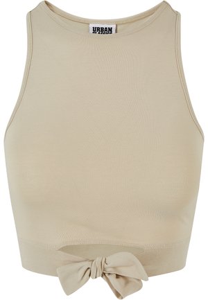 Beige krāsots krakklis, kas izgatavots no ribotām auduma, ar augstu apkakli un ar sasietu mezglu ap hem.