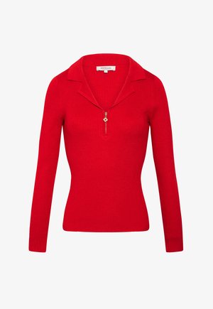 Pull rouge à manches longues en maille côtelée avec un petit col et une courte fermeture éclair au niveau de l'encolure, agrémentée d'une tirette en forme de fleur.