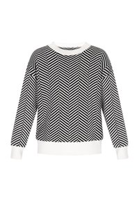 Pulover alb-negru cu un model în zigzag, guler rotund și manșete și tiv cu nervuri. Fabricat dintr-un material tricotat texturat.