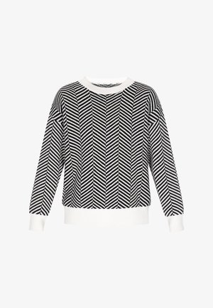 Sort og hvid sweater med et fiskebensmønster, rund halsudskæring og ribstrikkede manchetter og kant. Lavet af et struktureret strikstof.
