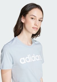 adidas Sportswear W LIN T - Triko s potiskem - blue