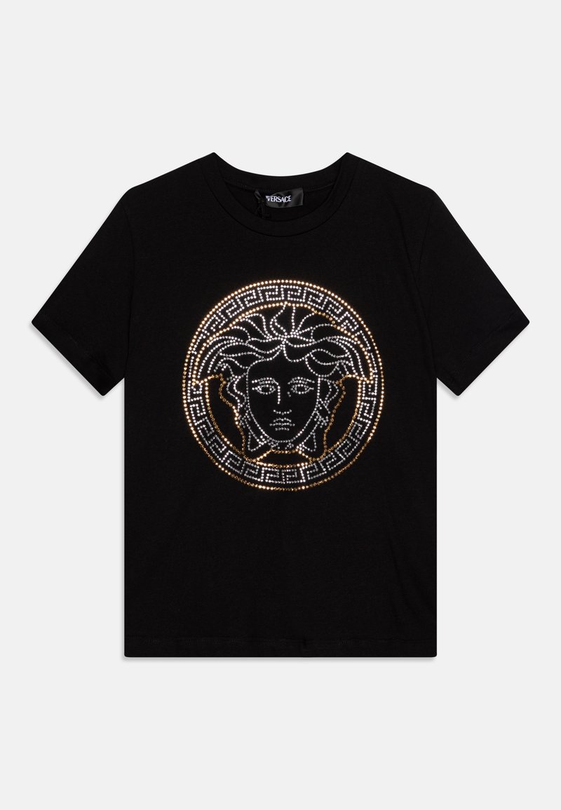 Camiseta de algodón negra con un gráfico circular de Medusa adornado con cristales blancos y dorados y un diseño de borde de clave griega.