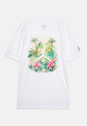 White cotton t-shirt featuring a colorful tropical floral graphic design with palm trees and pink flowers at the center; short sleeves.